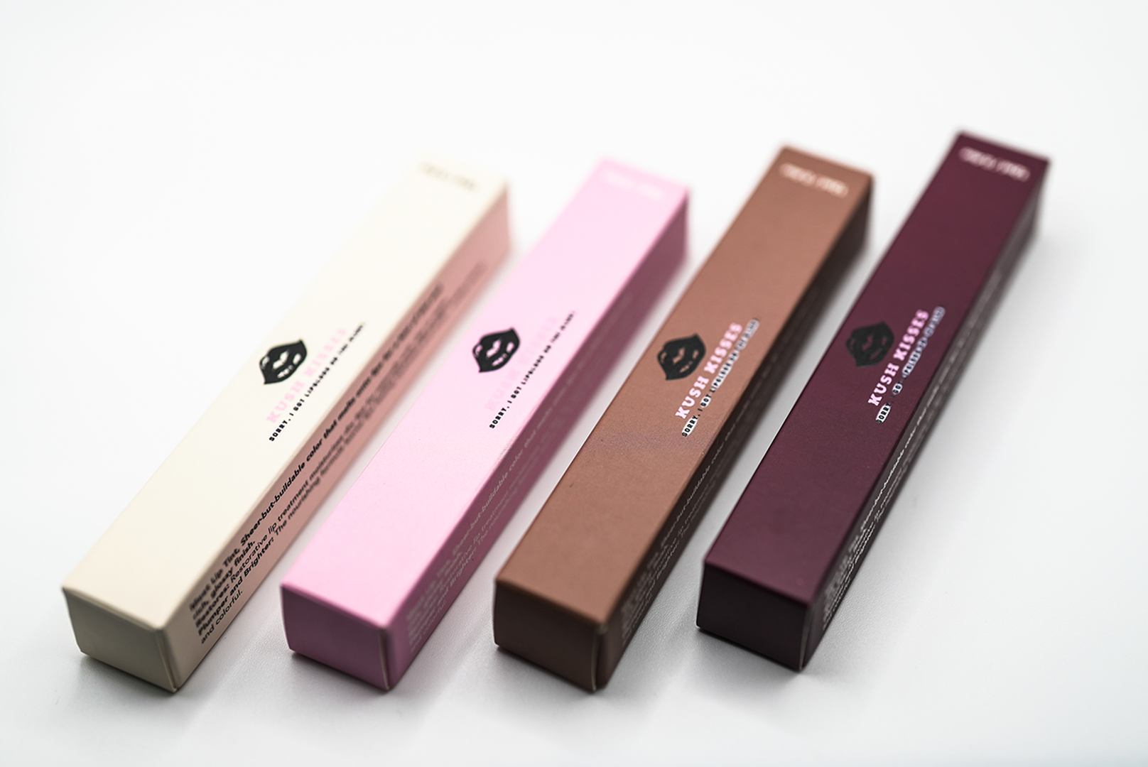 Kush Kisses lip gloss tube collection - Baby Peach, Baby Pink, Baby Brown and Brown shades